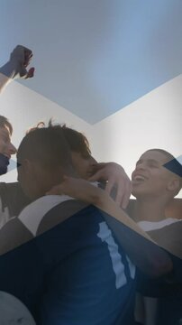 Animation of flag of scotland over diverse male rugby players celebrating