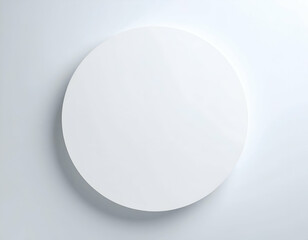 A pristine white circle casts a soft, elegant shadow on a smooth, light-toned background, creating a minimalist