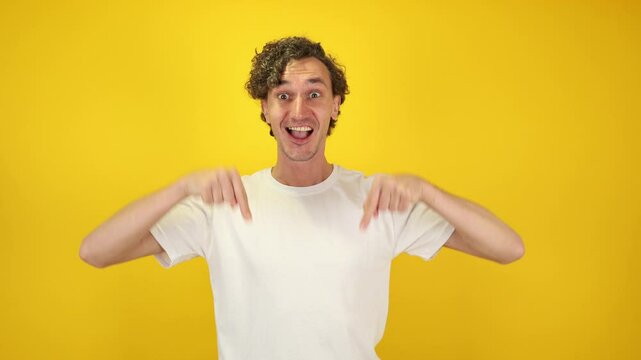 Confident man looking down pointing with both index fingers, nodding in agreement bold and expressive visual ideal for advertising, customer service, lifestyle branding, World Kindness Day campaigns - Powered by Adobe