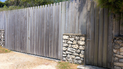 high portal wooden gate house in street view outdoor home door entrance pedestrian
