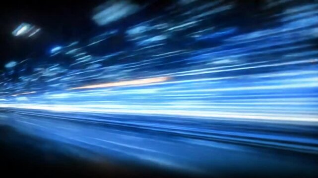 Dynamic blue light trails speeding through a blurred city at night, creating a fast paced abstract