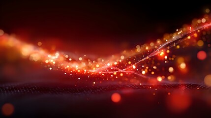 Abstract red glowing particles flowing over dark mesh surface with bokeh light effects and dynamic motion trails creating futuristic technology background.