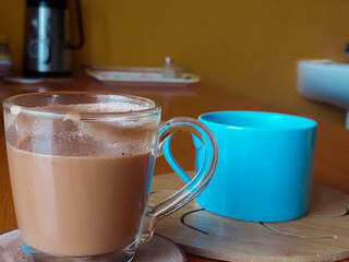 Two cup of milk tea in the table of typical bangali home