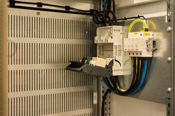 Fiber Optic Distribution Box Inside Electrical Cabinet With Connected Cables