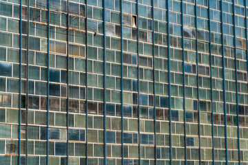 Large Industrial Building with Weathered Glass Panels