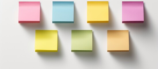 A vibrant set of colorful sticky notes on a blank background for your office reminder or memo