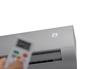 Remote control for air conditioning in man's hands, air conditioning device white background