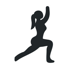 Fototapeta premium Silhouette of woman performing a warrior yoga pose