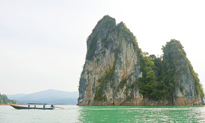 Boating on Cheow Lan Lake or Ratchaprapa Dam, a Popular Attraction in Khao Sok National Park, Surat Thani Province Southern Thailand