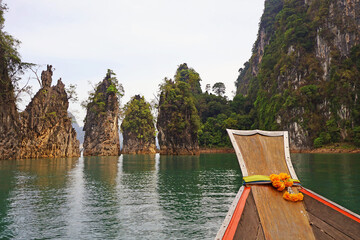 The Iconic Three Brothers Limestone Rocks in Ratchaprapa Dam or Cheow Lan Lake, Khao Sok National Park, Surat Thani, Southern Thailand
