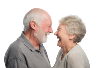 elderly couple laughing joyfully together isolated on white background
