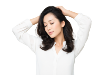 Relaxed woman with hand touching hair isolated on white background