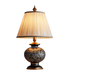 Elegant Table Lamp with Intricate Design Illuminated on Black Background, isolated on a transparent background