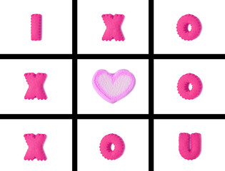 Hot Pink Typography of I LOVE U in Tic Tac Toe Game made with alphabet shaped cookies and marshmallow on transparent background, png file
