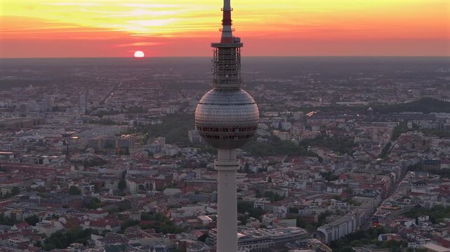Alexanderplatz TV Tower Close Up View, Fernsehturm at Sunset Time in Berlin City Center, Aerial Parallax Drone Shot.