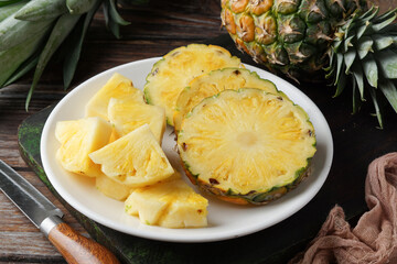 Close Up of Fresh Honey Pineapple with Juicy Yellow Flesh on Rustic Background