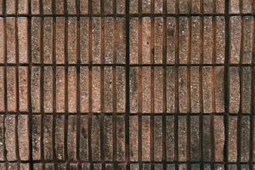 Textured Brick Wall Surface with Distinct Lines and Warm Earthy Tones Ideal for Background or Architectural Design