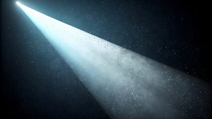 Bright blue spotlight beam illuminates a dark starry night sky with sparkling dust particles