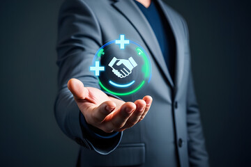 Businessman holding a glowing sphere with handshake and plus signs representing partnership and growth