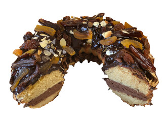 Chocolate cake with rich icing, dried fruit and nuts. A gourmet and luxurious dessert perfect for sweet indulgence, elegant presentation and sweet-toothed moments.