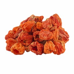 Pile of dried red pepper flakes isolated on a white background.