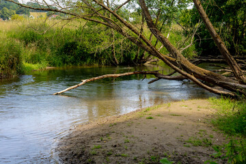 Summer landscape with small river in Valkenburg aan de Geul, The Geul is a river in Belgium and in the Netherlands, A right-bank tributary to the river Meuse, The southeastern Dutch province, Limburg.