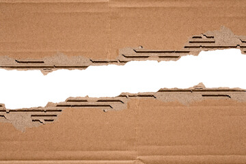torn or ripped brown cardboard paper isolated on transparent background,realistic piece of torn...