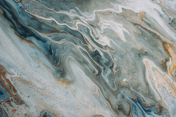 Abstract acrylic fluid texture in blue tones and golden splashes