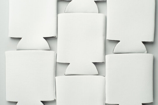 Can cooler sleeve on isolated background. Flat lay or top view. Neoprene can cooler blank.