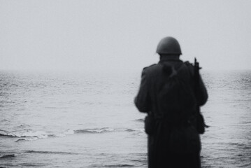 HISTORICAL RECONSTRUCTION - A soldier of the Second Polish Army during World War II on the coast of...