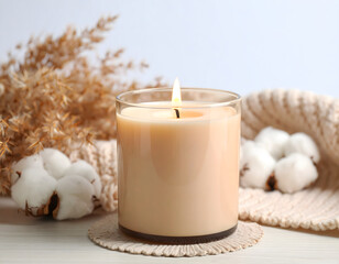Lit Beige Candle with Cotton Thread and Pampas Grass 