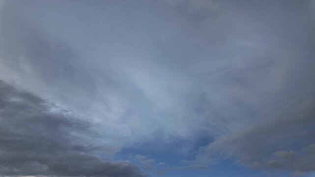 Dramatic Moody Clouds Moving in Blue Sky Timelapse