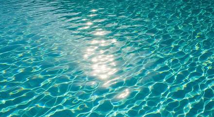 Obraz premium Sun-Kissed Serenity: Reflections and Ripples in a Tranquil Swimming Pool, Capturing the Play of Light on Aqua Water, Perfect for Summertime Relaxation