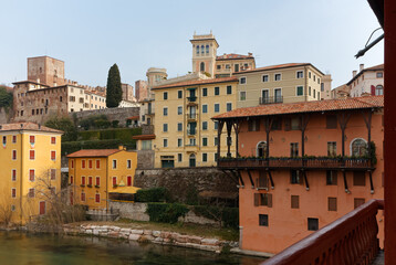 Beautiful historic architectures of Bassano del Grappa, Italy, seen from its famous bridge over Brenta river