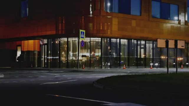 Saint Petersburg, Krasnoe Selo, Russia - July 5, 2024: Krasnoselskoe highway at night, transport moves, urban infrastructure of a big city.