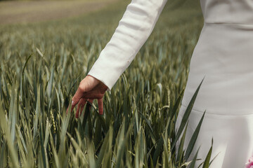 Bride's Hand Gracefully Gliding Through the Grass , Gracefully Touch