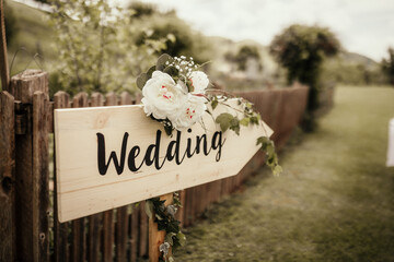 Vintage wedding sign. Handmade wooden board with the inscription Wedding