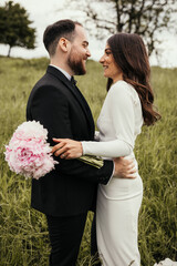 Bride and Groom Smiling at eachother, Intimate Romantic Moment, Newlyweds, Outdoor Elopement