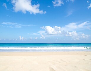 Obraz premium Scenic beach view with blue sky and fluffy clouds, perfect for summer ads, travel backgrounds, tourism promotions, or tropical holiday visuals with clean and inviting composition.