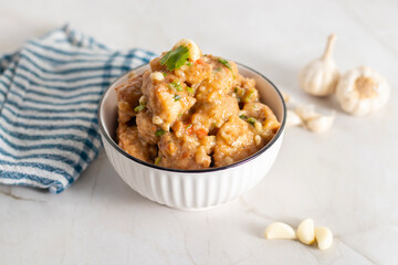 Garlic butter chicken is a delicious dish made with tender chicken cooked in a rich garlic and butter sauce, enhanced with herbs, spices, and lemon.
