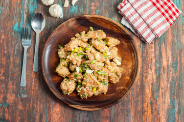 Garlic butter chicken is a delicious dish made with tender chicken cooked in a rich garlic and butter sauce, enhanced with herbs, spices, and lemon.
