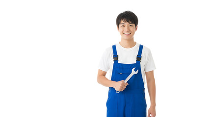 Smiling asian mechanic holding wrench in blue overalls ready for automotive repair service job today on transparent background