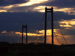 Suspension bridge over Danube River in Braila, Romania at dusk