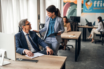 Professional Team Collaborating in Modern Stylish Office Setting
