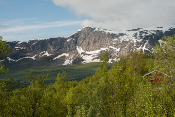 Clouds Over Norway’s Snowy Mountains