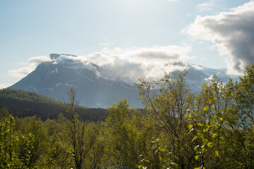 Clouds Over Norway’s Snowy Mountains