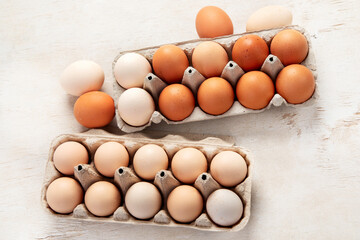 Diggerent kind of fresh eggs in containers.