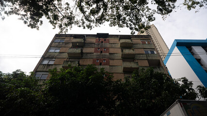 Wide-angle bottom view of residential buildings on an avenue in the city of Salvador, Bahia.