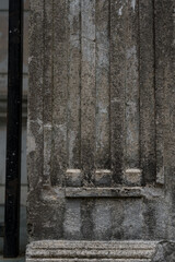 design of an old, shabby, dirty column. The column in close-up