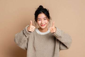 Asian Woman Giving Thumbs Up